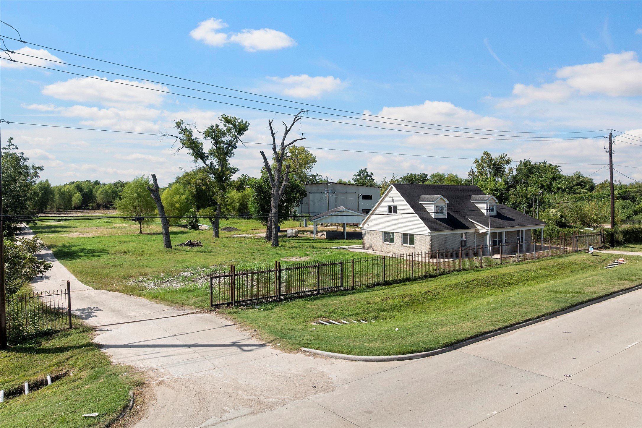 822 Aldine Mail Rte Road Houston, TX 77037 - Photo 20 of 44 a front view of a house with a yard