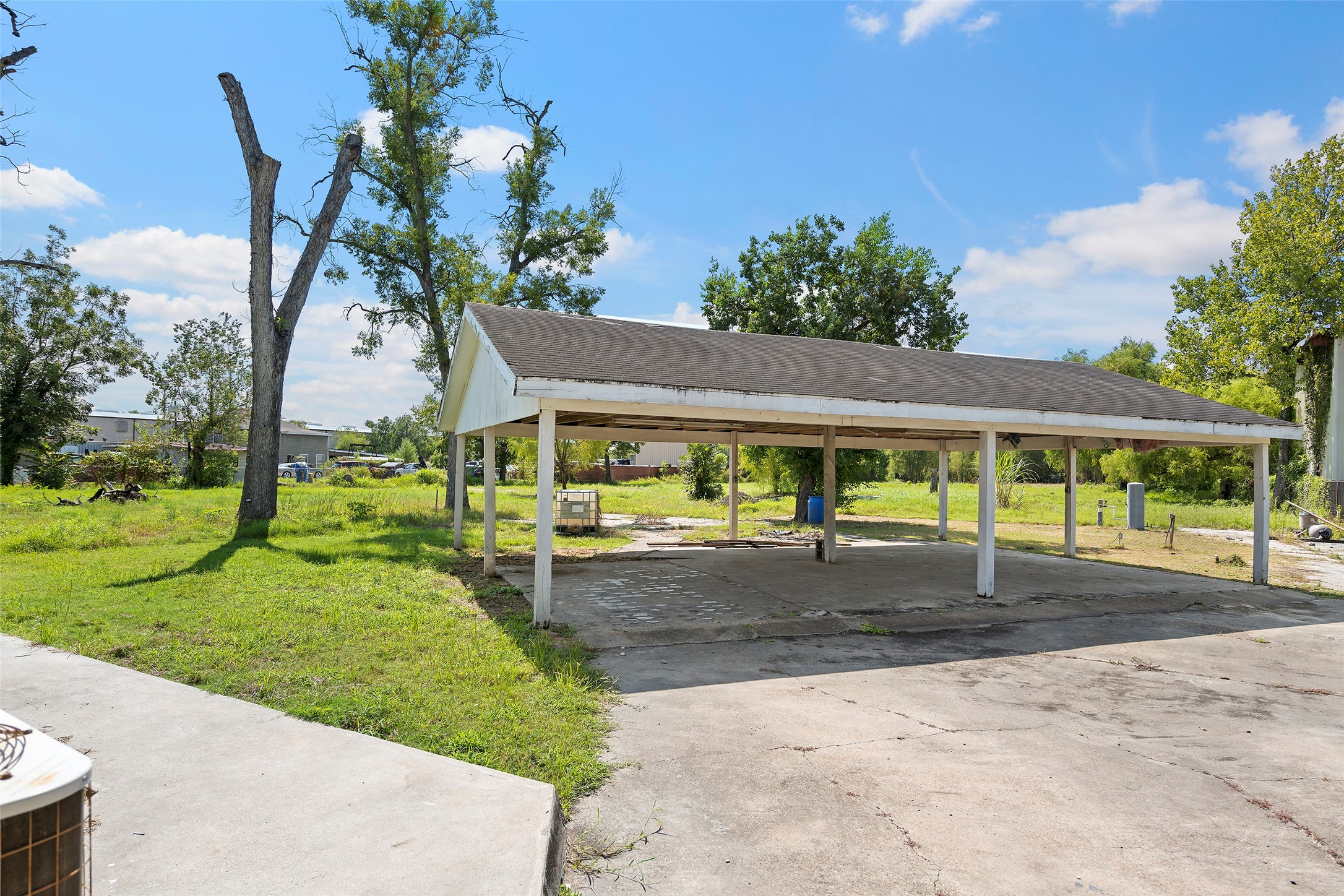 822 Aldine Mail Rte Road Houston, TX 77037 - Photo 27 of 44 a front view of house with yard and green space