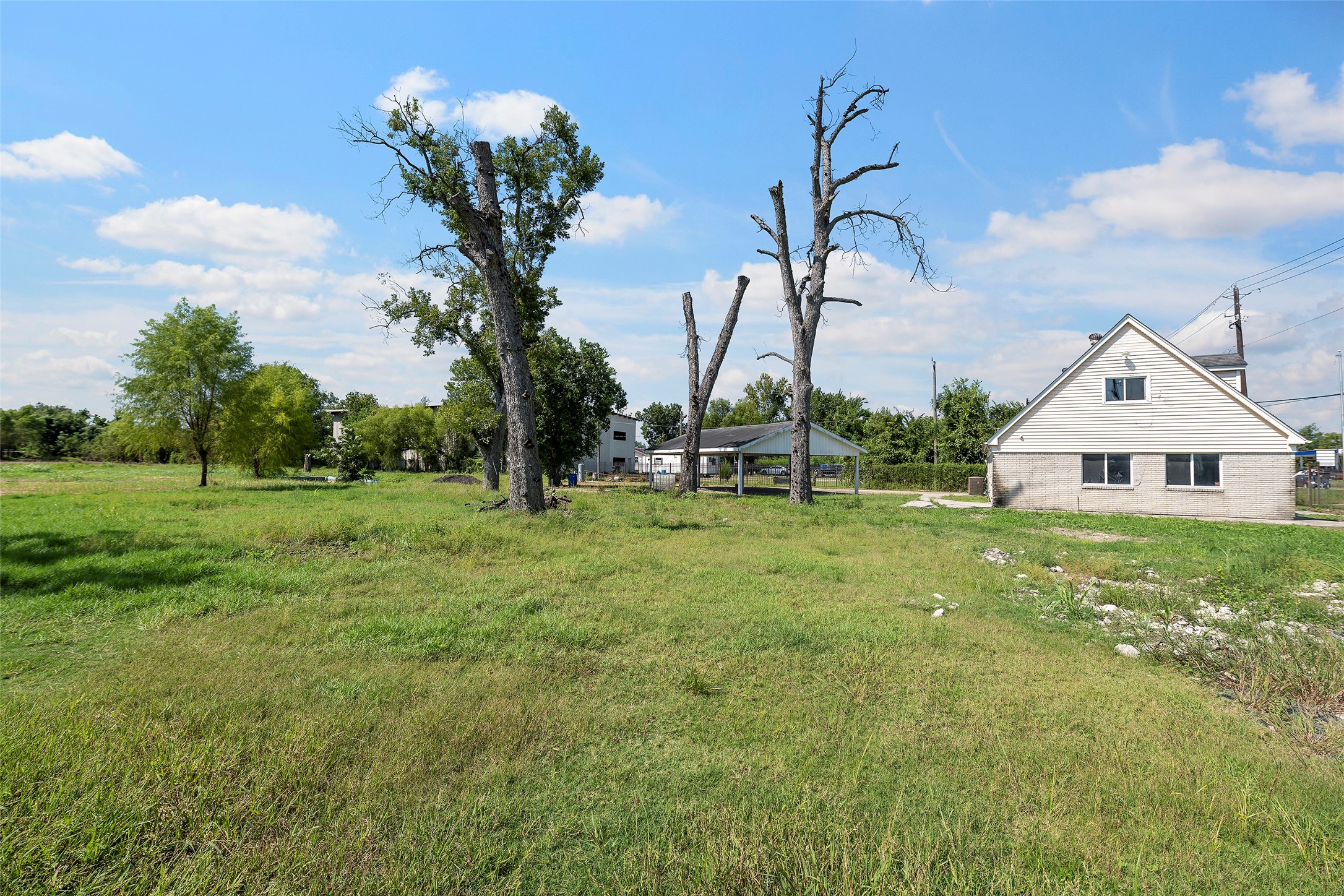 822 Aldine Mail Rte Road Houston, TX 77037 - Photo 28 of 44 a front view of a house with garden