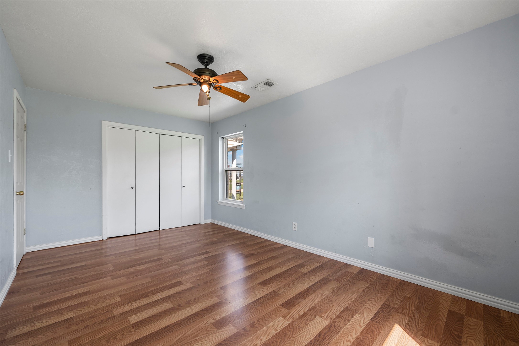 822 Aldine Mail Rte Road Houston, TX 77037 - Photo 37 of 44 a view of room with a ceiling fan and window