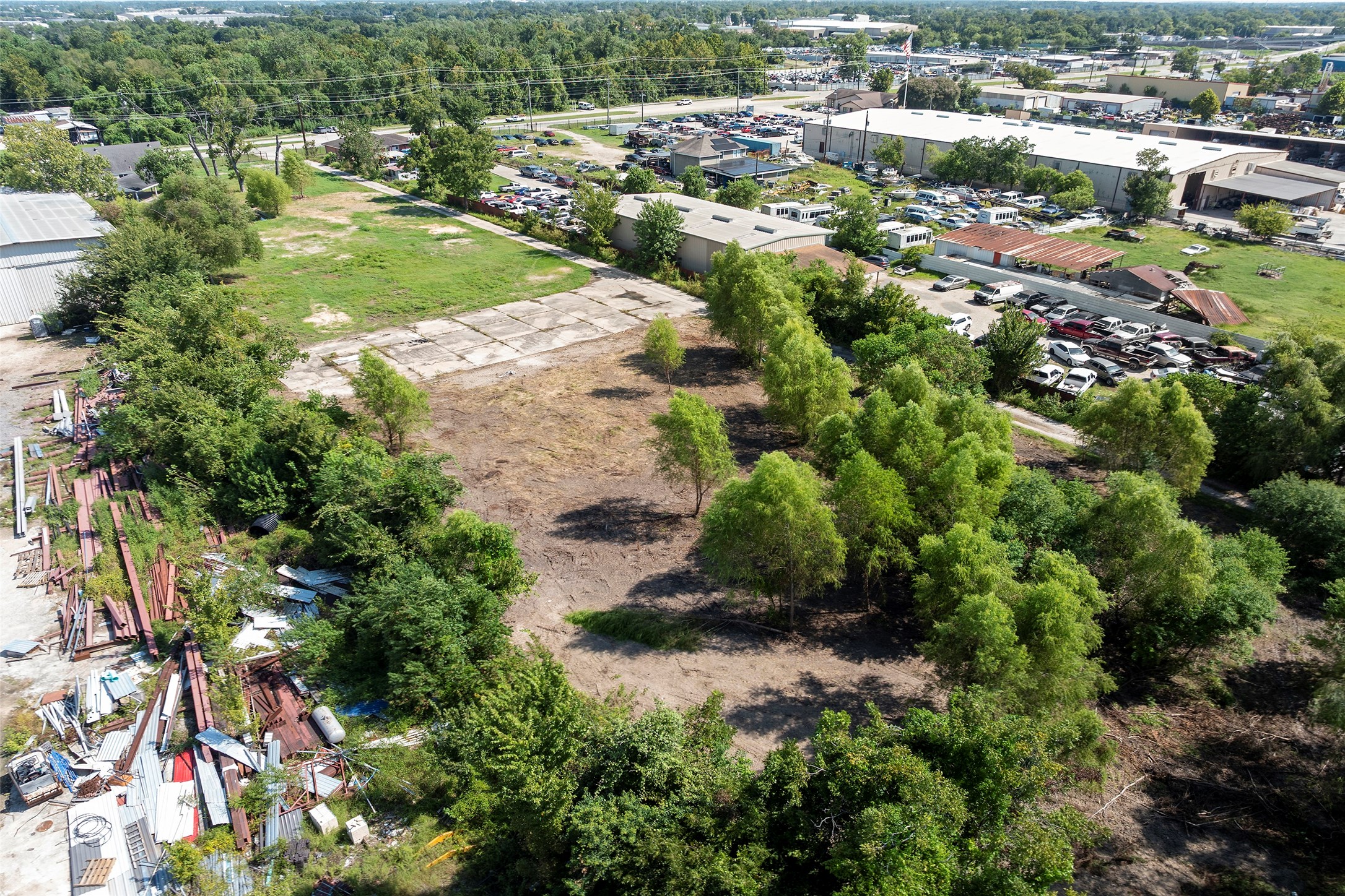 822 Aldine Mail Rte Road Houston, TX 77037 - Photo 6 of 44 an aerial view of residential houses with outdoor space and trees