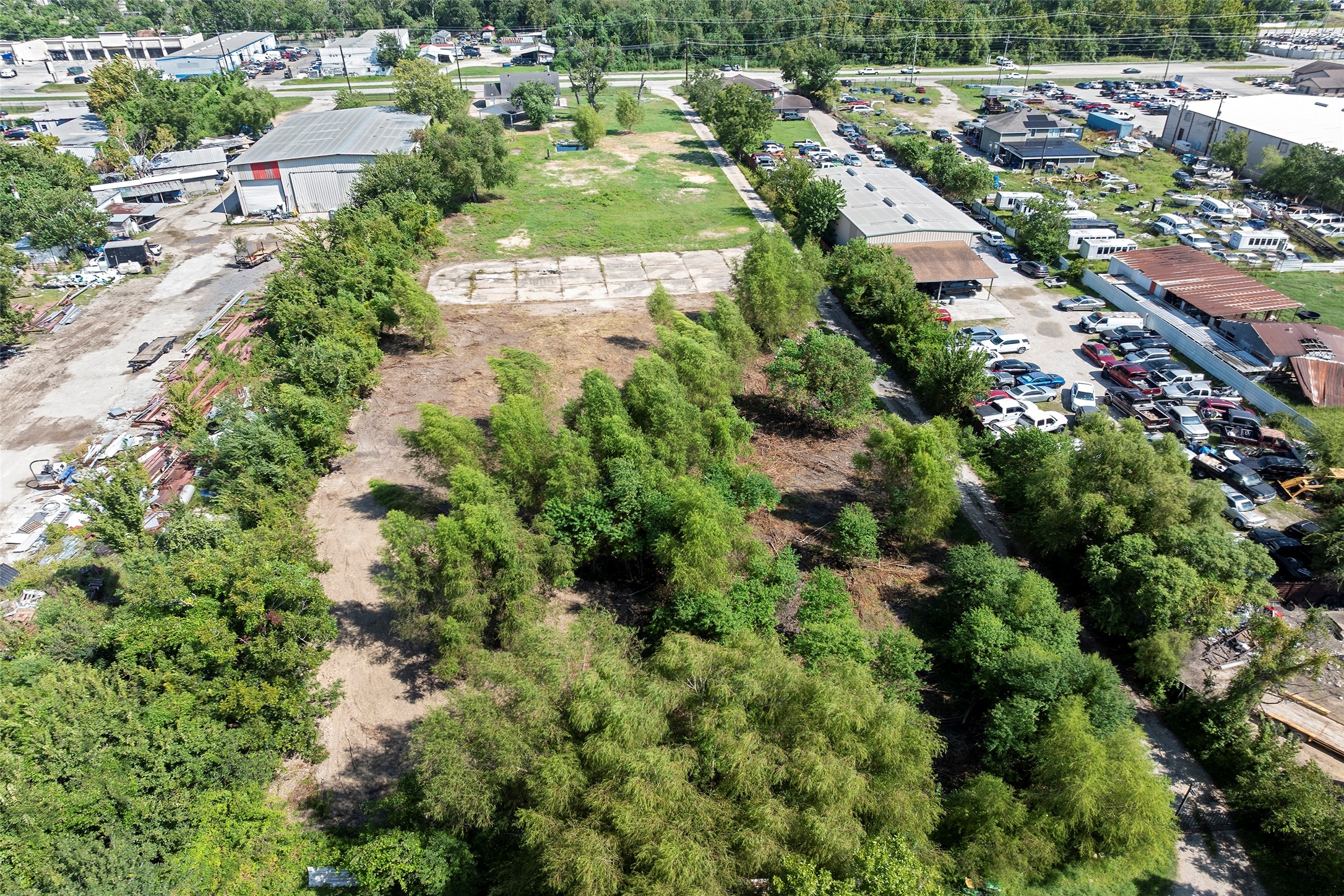 822 Aldine Mail Rte Road Houston, TX 77037 - Photo 7 of 44 an aerial view of residential houses with outdoor space and trees