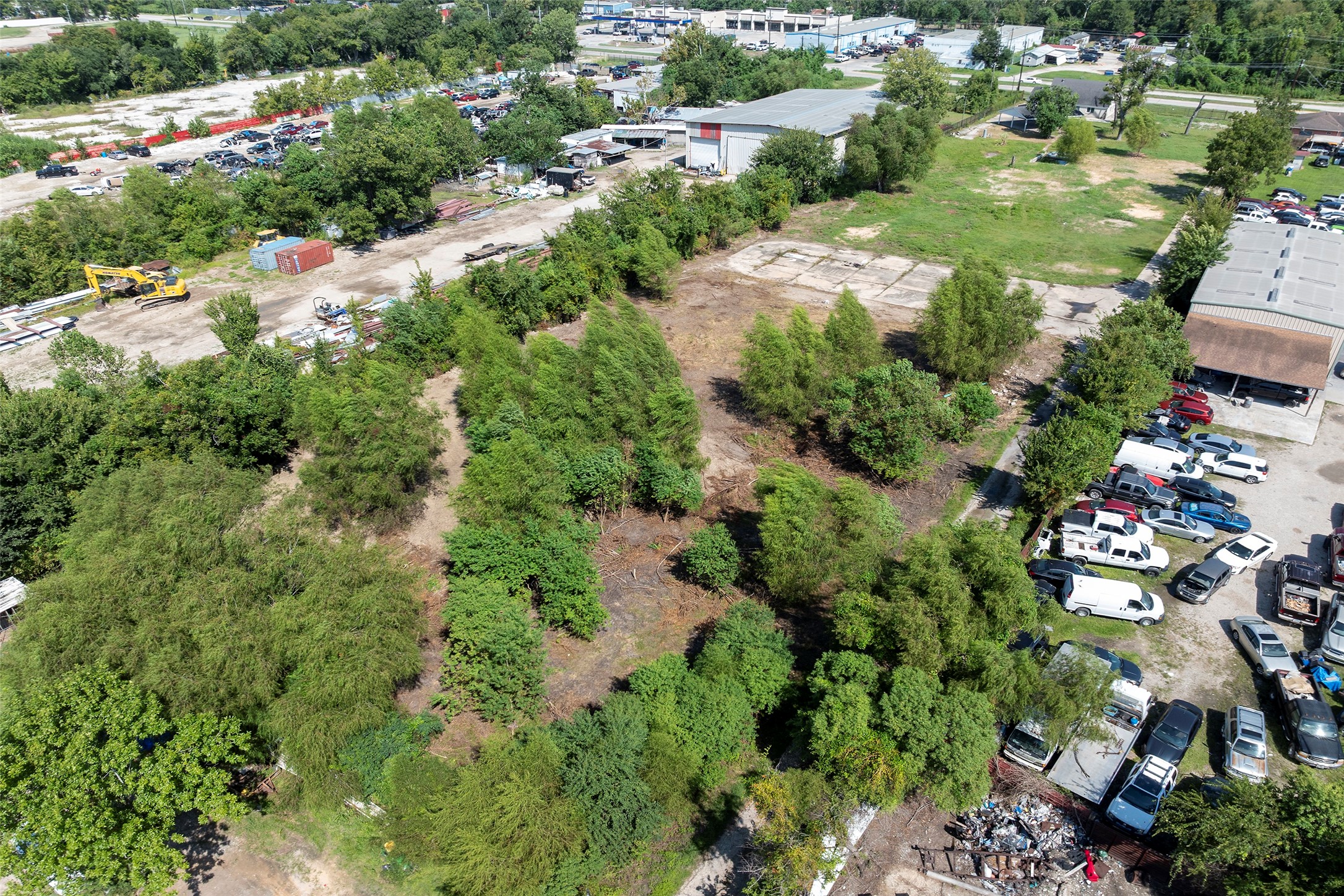 822 Aldine Mail Rte Road Houston, TX 77037 - Photo 8 of 44 an aerial view of residential houses with outdoor space and trees all around