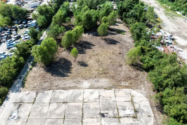 a view of a lake with a building in the background