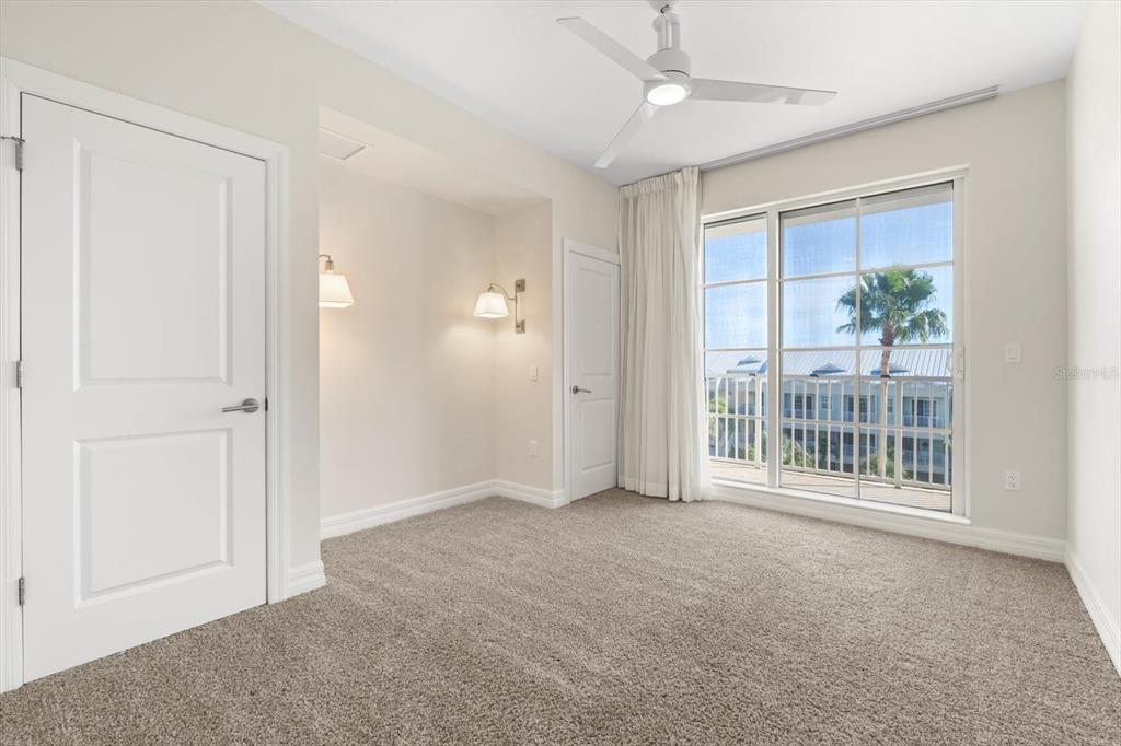 536 Bahia Beach Boulevard, Unit 431C Ruskin, FL 33570 - Photo 10 of 27 an empty room with windows and entrance