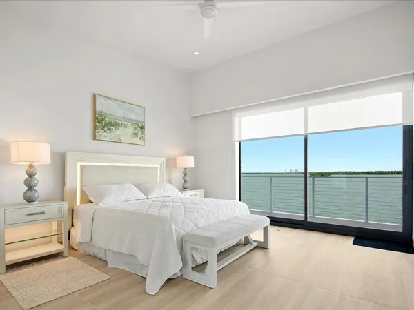 an aerial view of a house with a ocean view