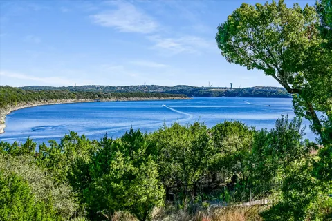 a view of a lake with a big yard