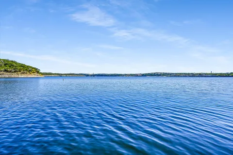 wooden floor with a lake view