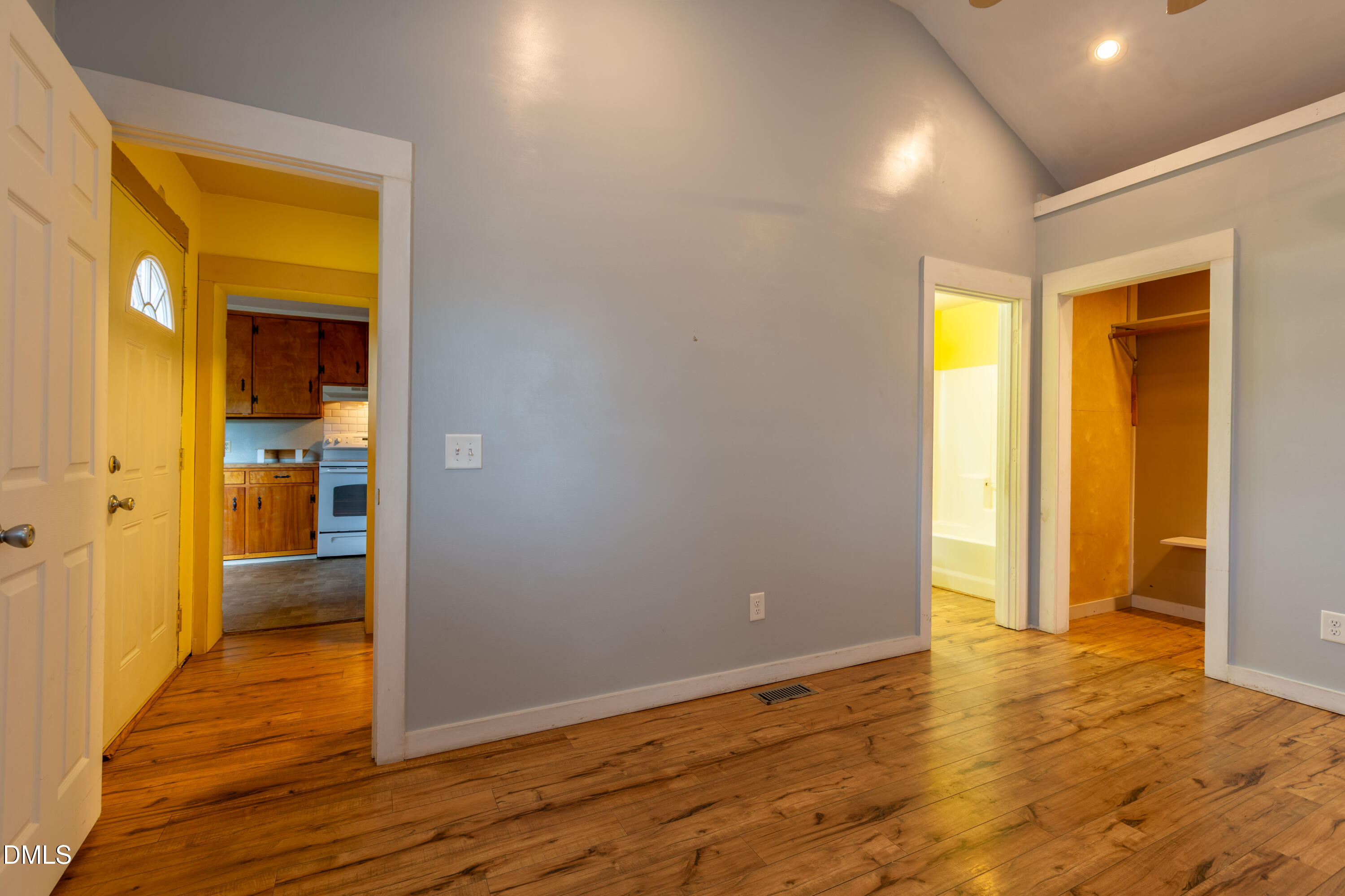 4295 Virgilina Road Roxboro, NC 27574 - Photo 23 of 46 a view of livingroom with hardwood floor and a bathroom
