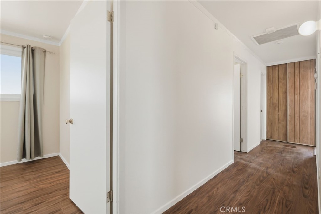 66270 Brant Crossing Road Joshua Tree, CA 92252 - Photo 24 of 46 a view of hallway with wooden floor