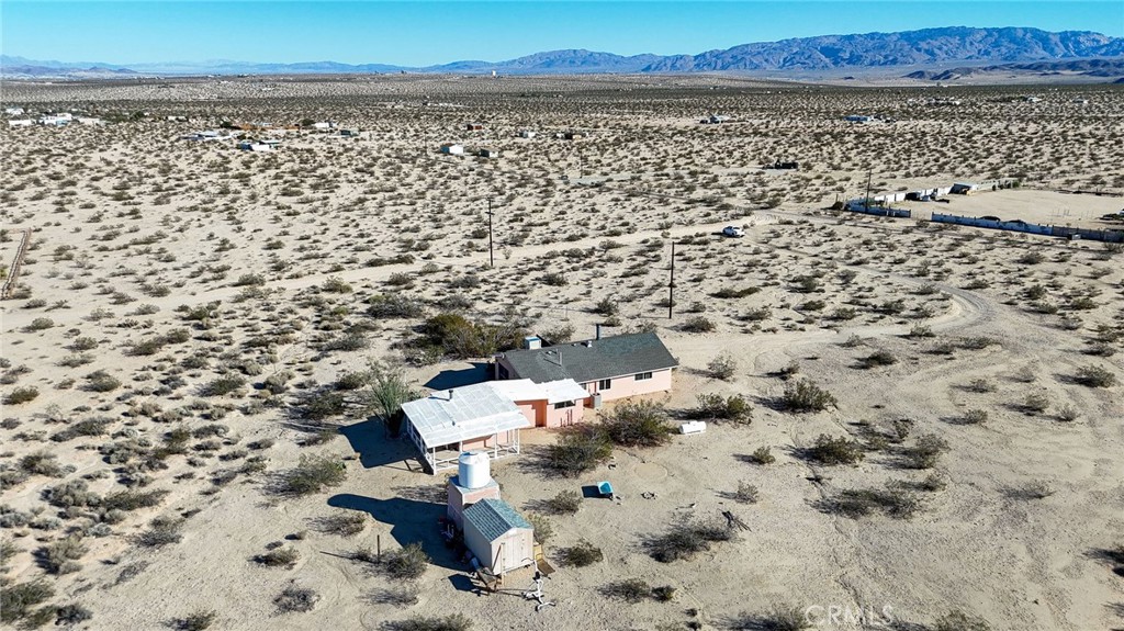 66270 Brant Crossing Road Joshua Tree, CA 92252 - Photo 40 of 46 an aerial view of a yard
