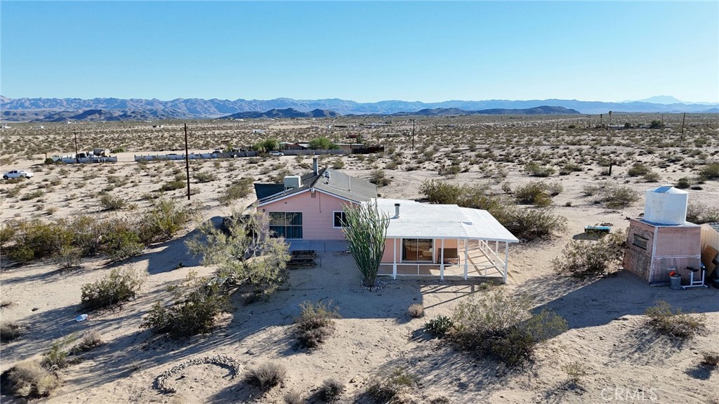 66270 Brant Crossing Road Joshua Tree, CA 92252 - Photo 4 of 46 a view of a city with a mountain
