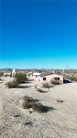 a view of a terrace with wooden floor and city view