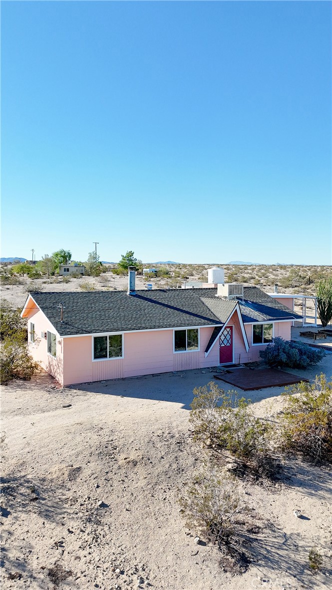 66270 Brant Crossing Road Joshua Tree, CA 92252 - Photo 43 of 46 a view of a terrace with wooden floor and city view