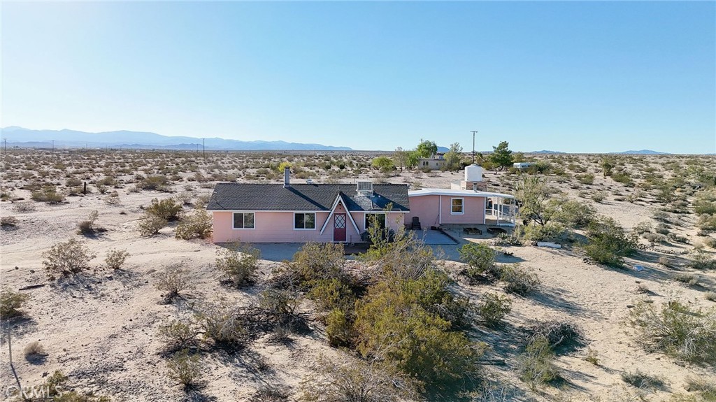 66270 Brant Crossing Road Joshua Tree, CA 92252 - Photo 44 of 46 an aerial view of a house with a yard