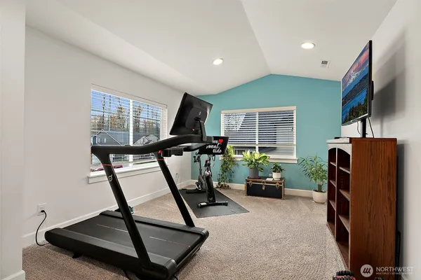 a view of a room with gym equipment
