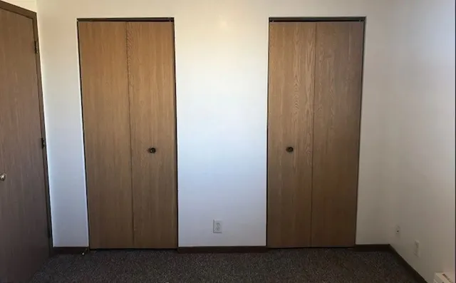 a view of door with closet area