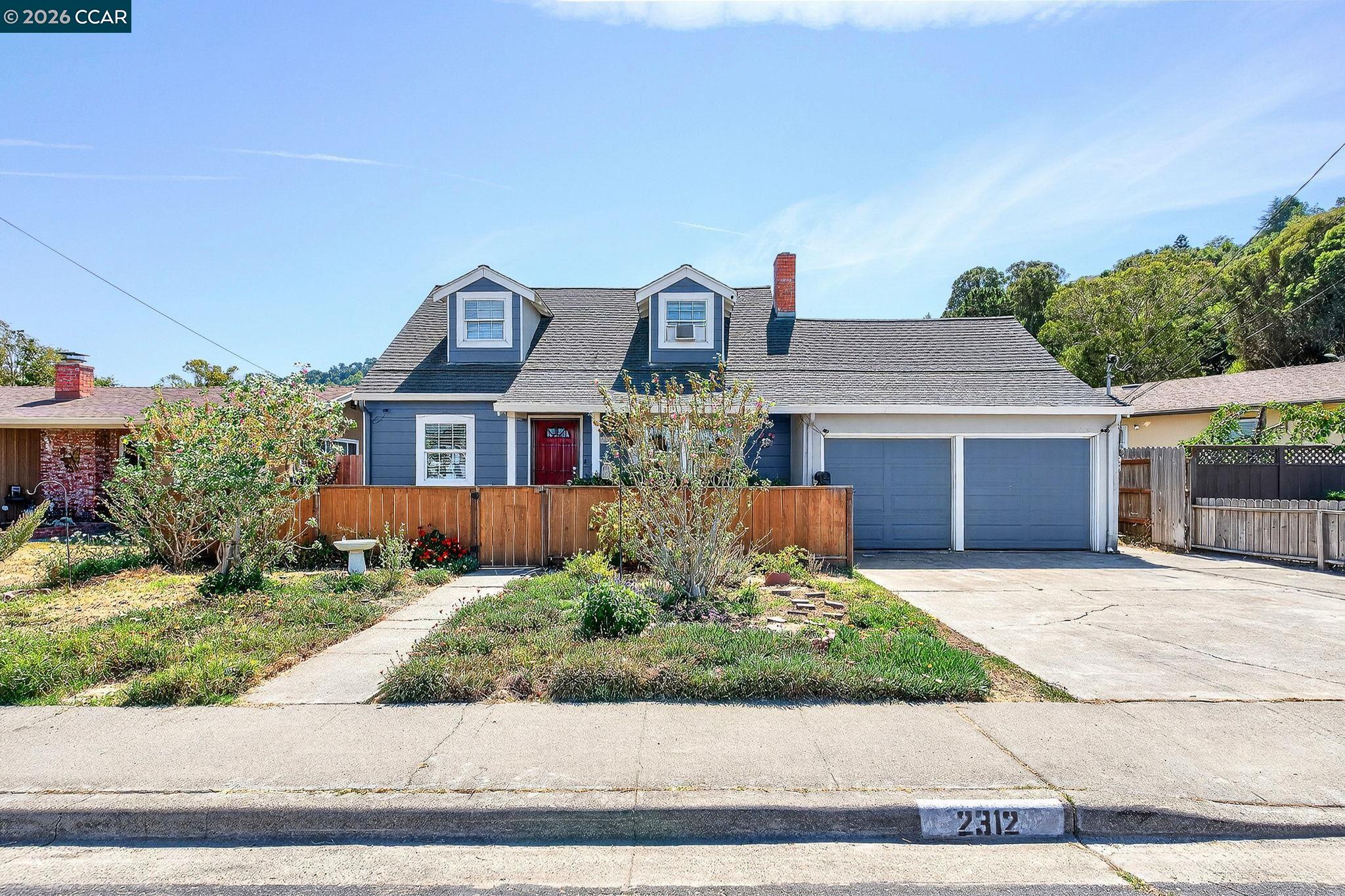2312 Granada Court Pinole, CA 94564 - Photo 2 of 60 front view of a house with a yard