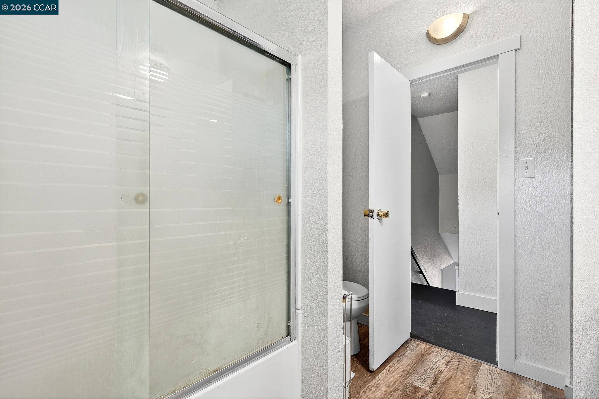 2312 Granada Court Pinole, CA 94564 - Photo 29 of 60 a view of a bathroom with a shower and a sink