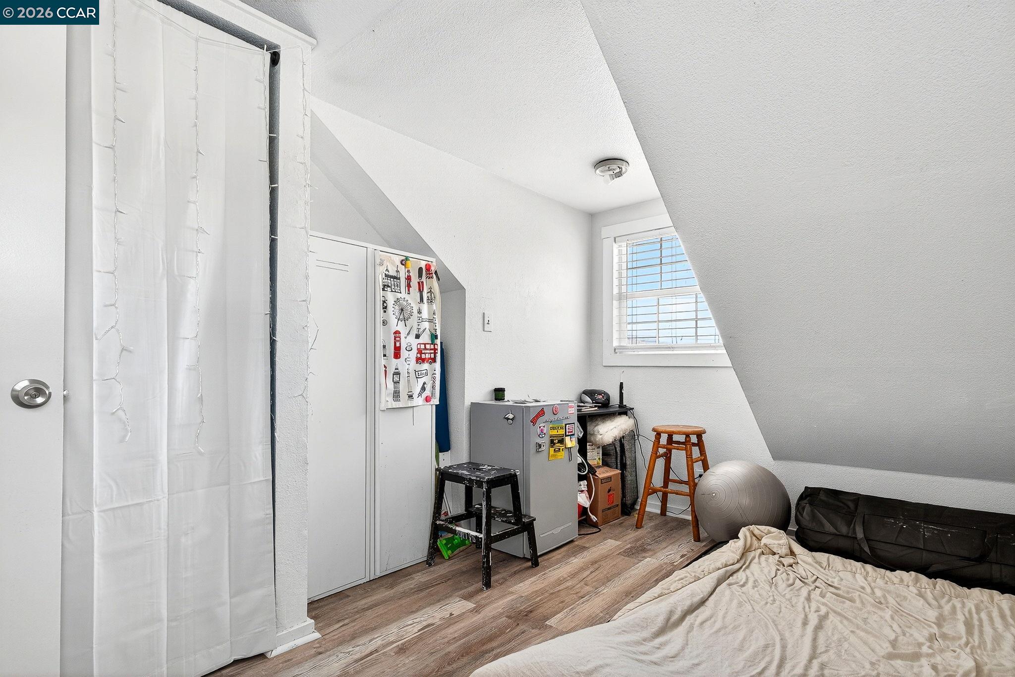 2312 Granada Court Pinole, CA 94564 - Photo 31 of 60 a bed room with a bed and a window