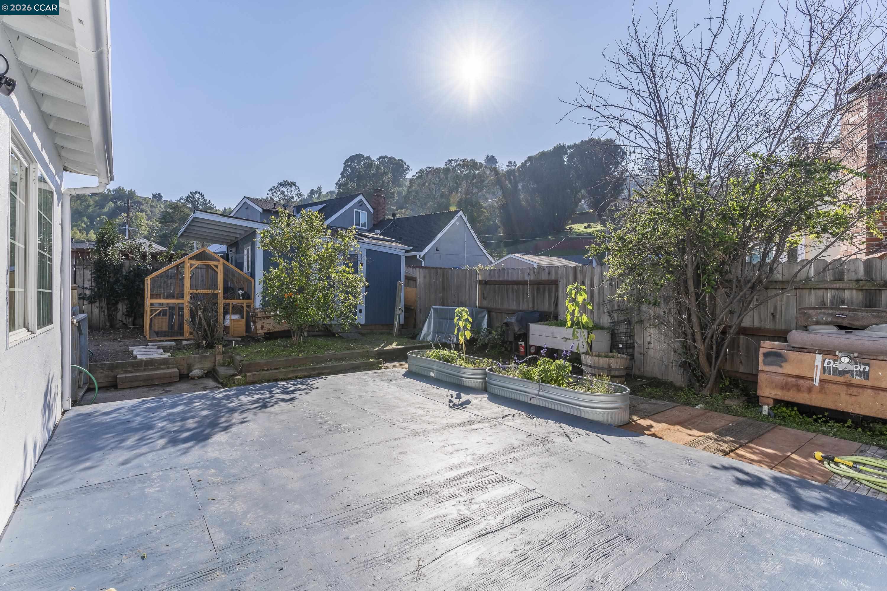 2312 Granada Court Pinole, CA 94564 - Photo 50 of 60 a view of a house with a yard