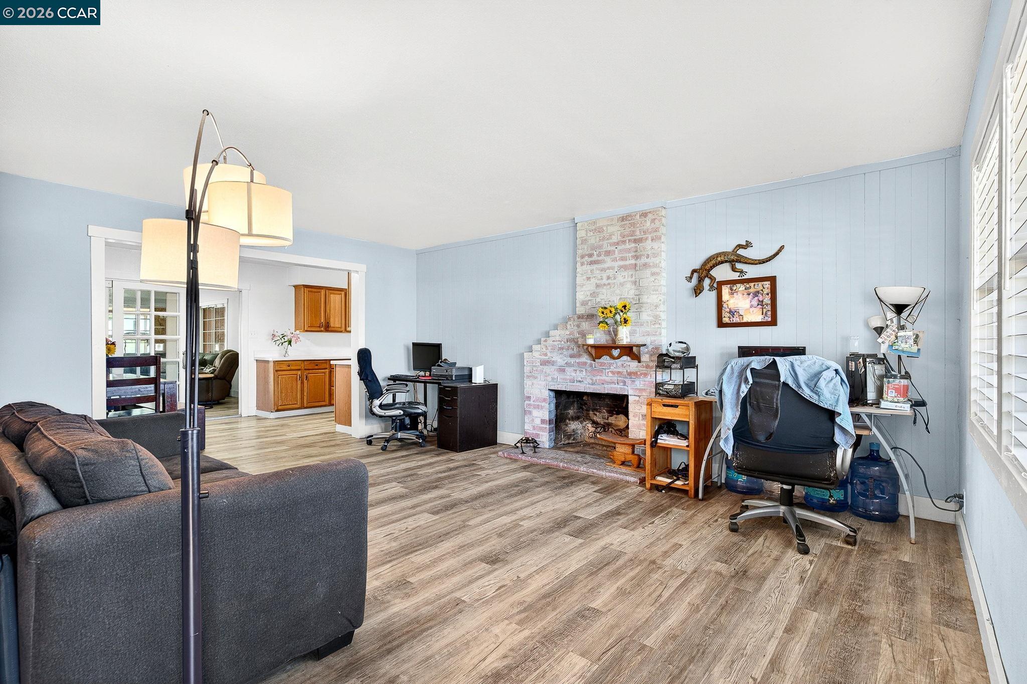 2312 Granada Court Pinole, CA 94564 - Photo 5 of 60 a living room with furniture and wooden floor