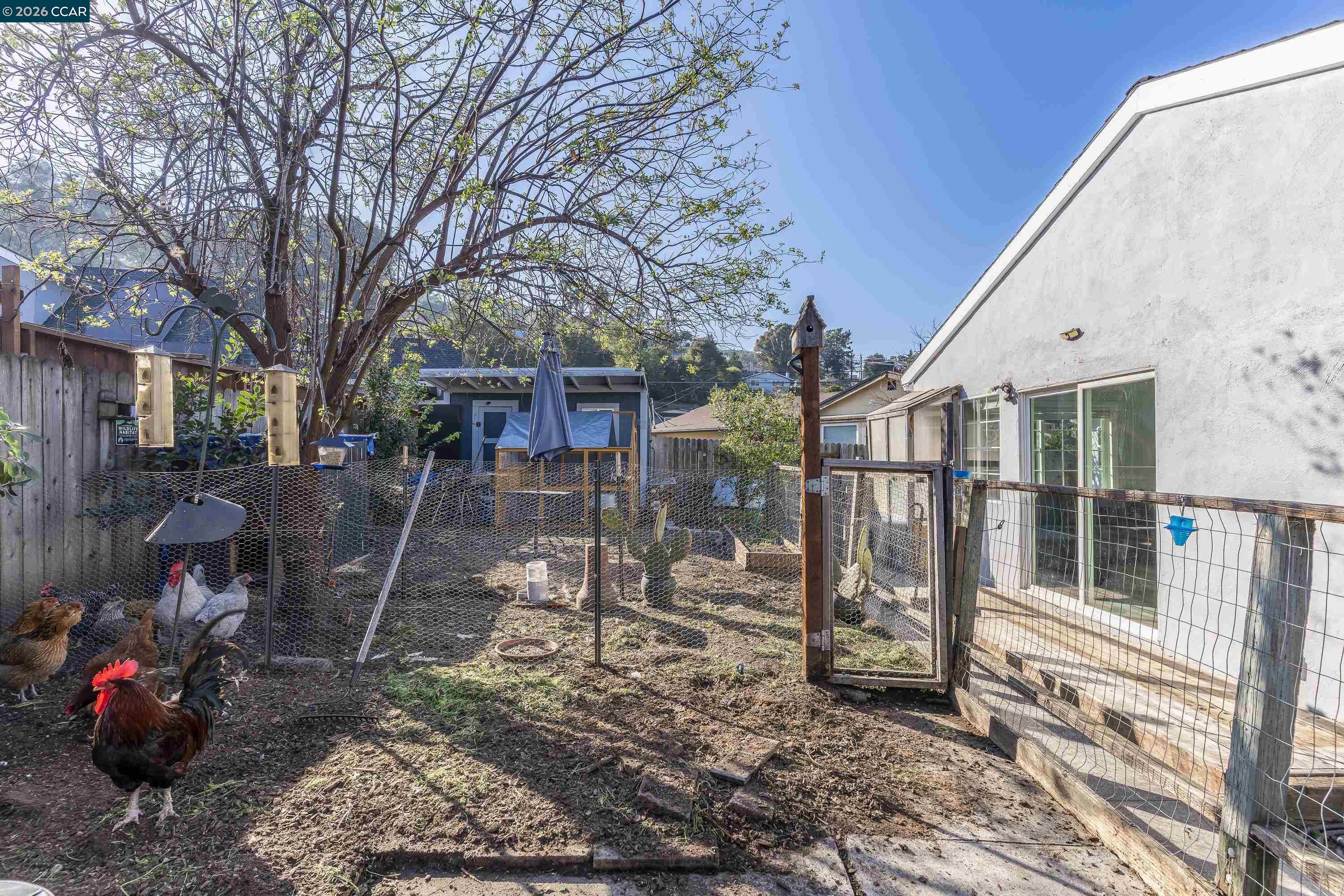 2312 Granada Court Pinole, CA 94564 - Photo 58 of 60 a view of a house with a backyard