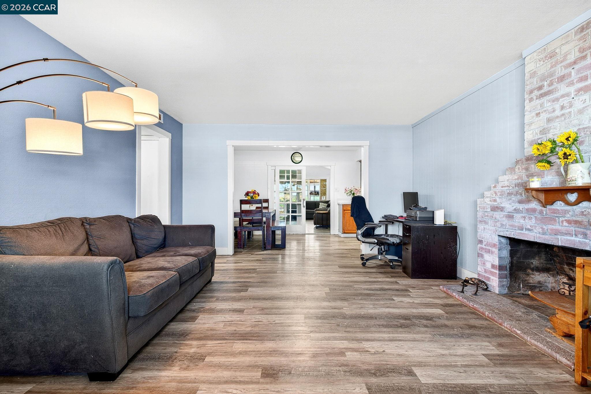 2312 Granada Court Pinole, CA 94564 - Photo 7 of 60 a living room with furniture and fireplace