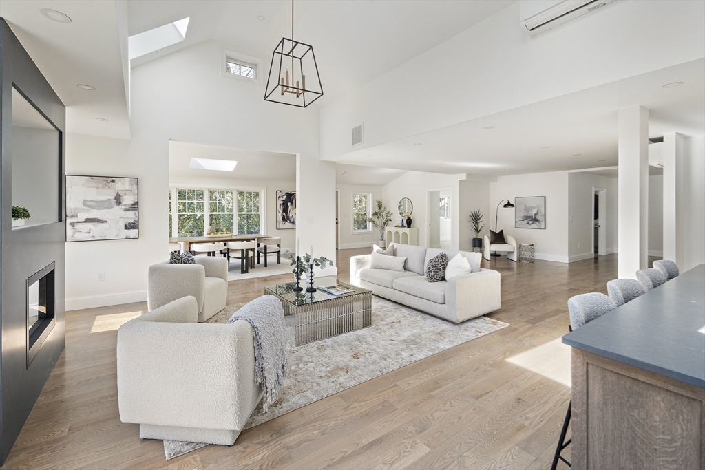 Lot 50 Barnard Hill Road Boylston, MA 01505 - Photo 11 of 30 a living room with furniture and a chandelier