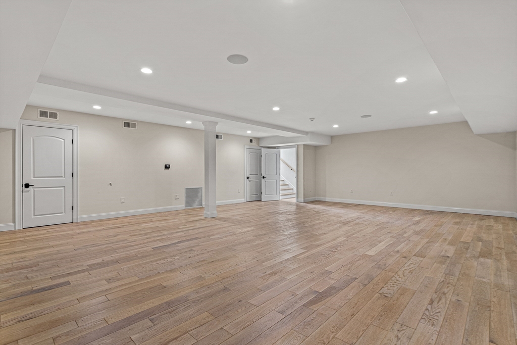 Lot 50 Barnard Hill Road Boylston, MA 01505 - Photo 27 of 30 a view of an empty room with wooden floor