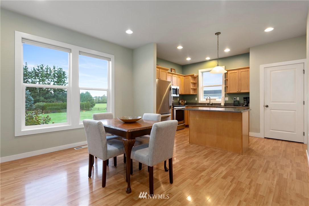106 Ridgeview Street Sumas, WA 98295 - Photo 18 of 31 a view of a dining room with furniture and wooden floor