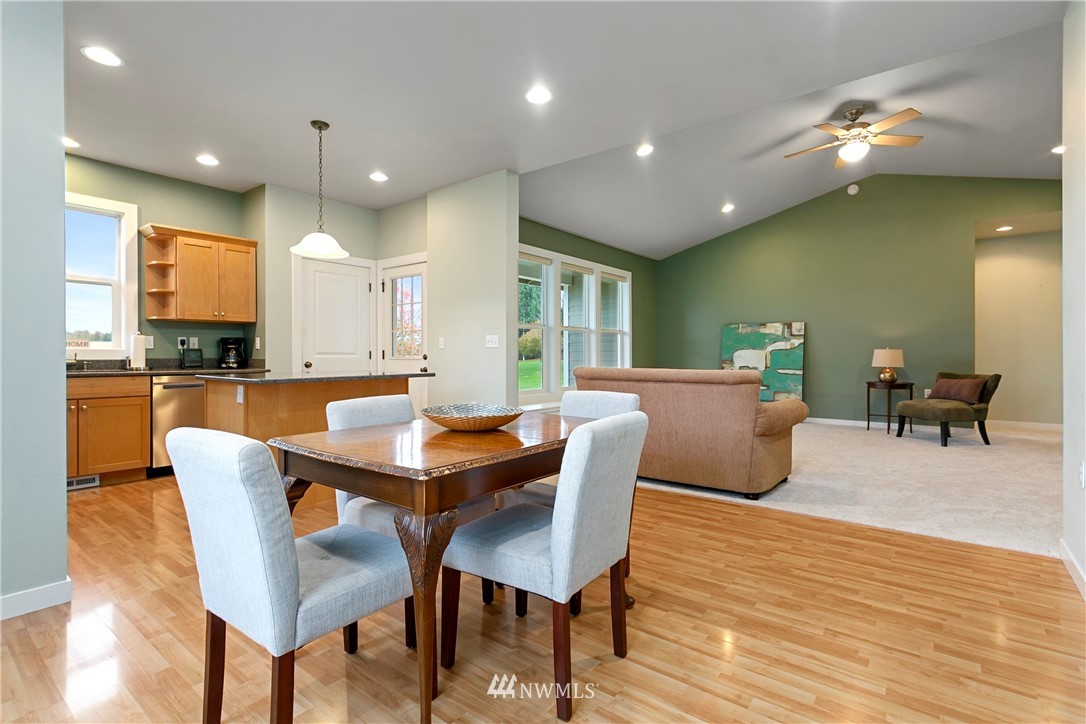 106 Ridgeview Street Sumas, WA 98295 - Photo 19 of 31 a view of a dining room with furniture and wooden floor