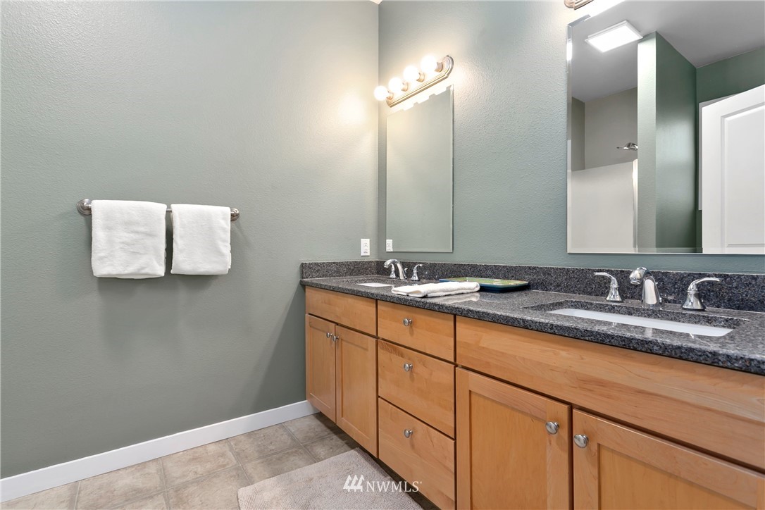 106 Ridgeview Street Sumas, WA 98295 - Photo 7 of 31 a bathroom with a sink and a mirror