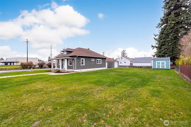 a view of a house with a big yard