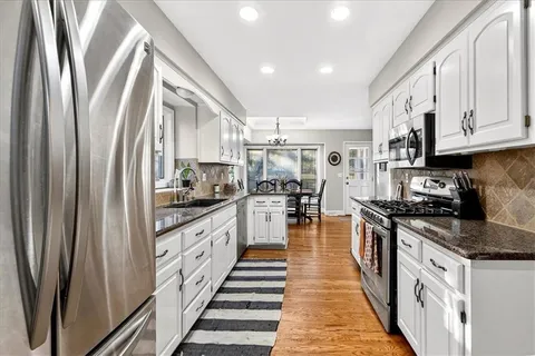 $365,000 | 1029 Northeast Trailwood Drive, Lee's Summit, MO 64086