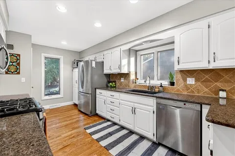 $365,000 | 1029 Northeast Trailwood Drive, Lee's Summit, MO 64086