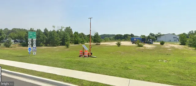 a view of a golf course with a lake