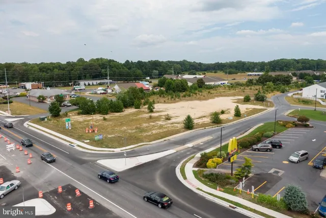 a view of a swimming pool with a lake view and mountain view