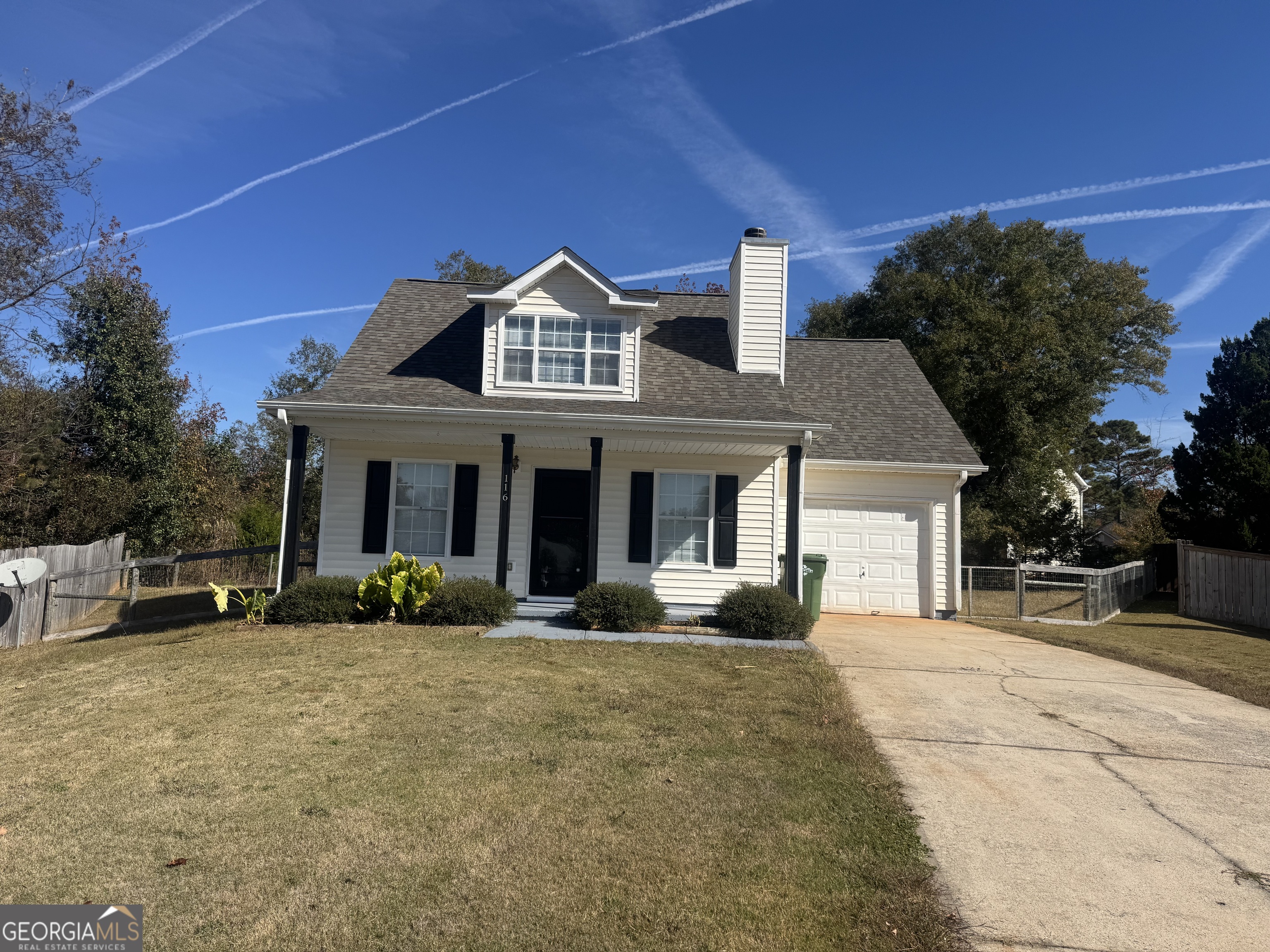 116 Pointe Court Griffin, GA 30224 - Photo 1 of 17 a front view of a house with a yard