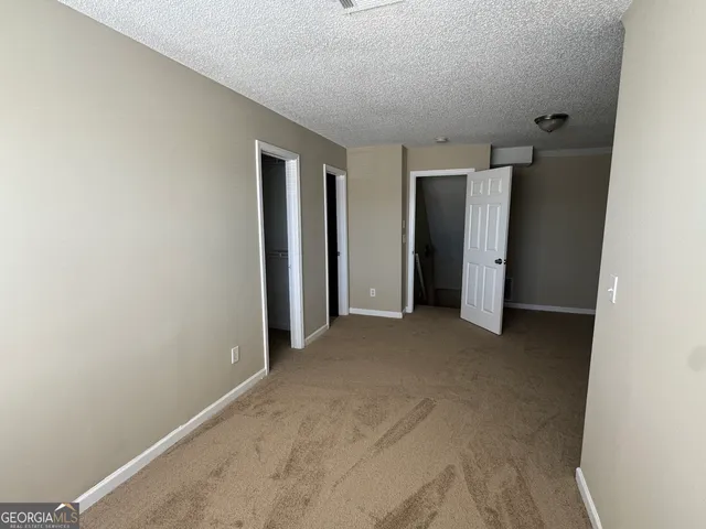 a view of a room with racks on the wall