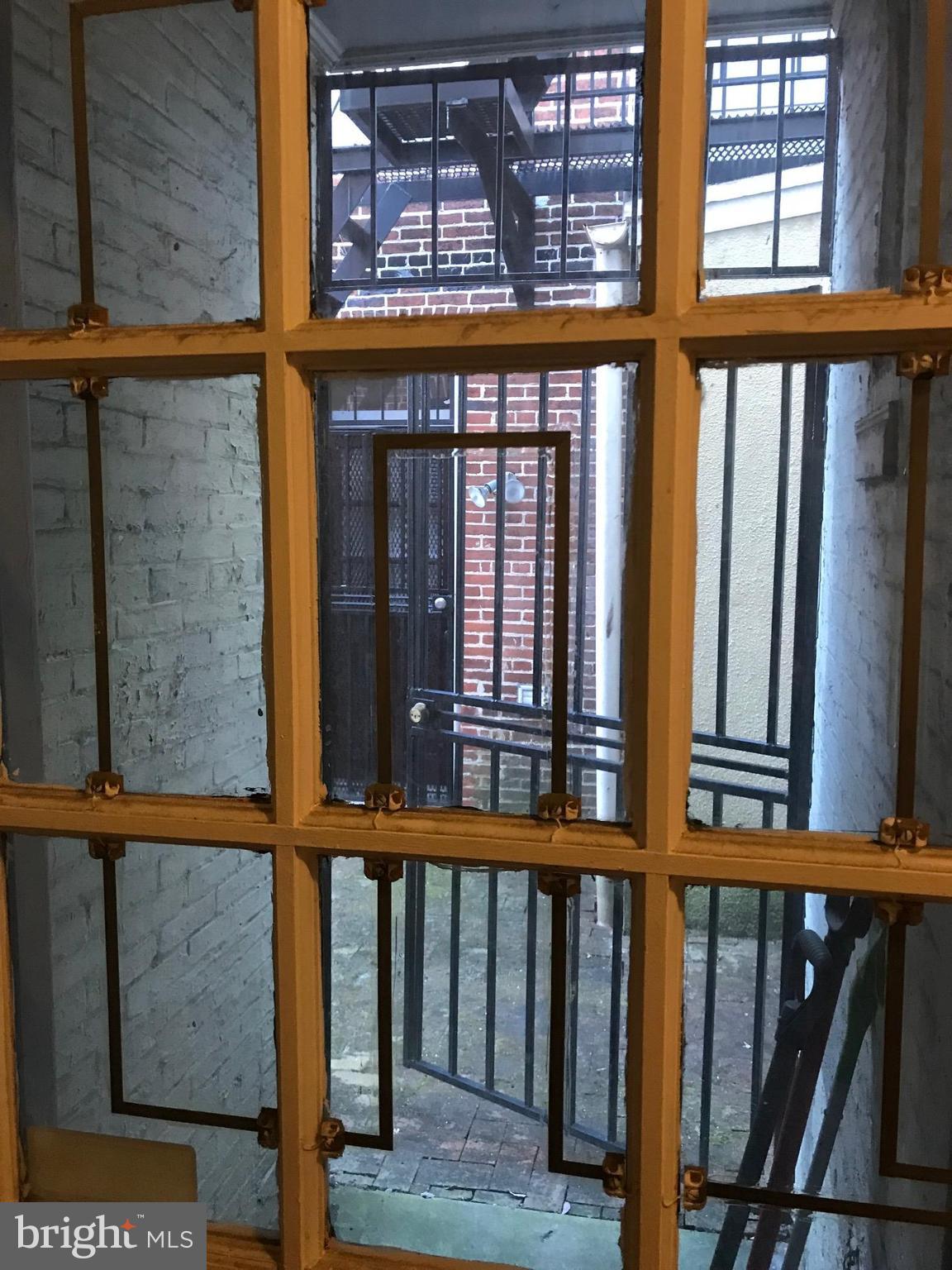 816 West Lombard Street Baltimore, MD 21201 - Photo 5 of 28 Side Exit to Side Outdoor Area - Shared w/Neighbor