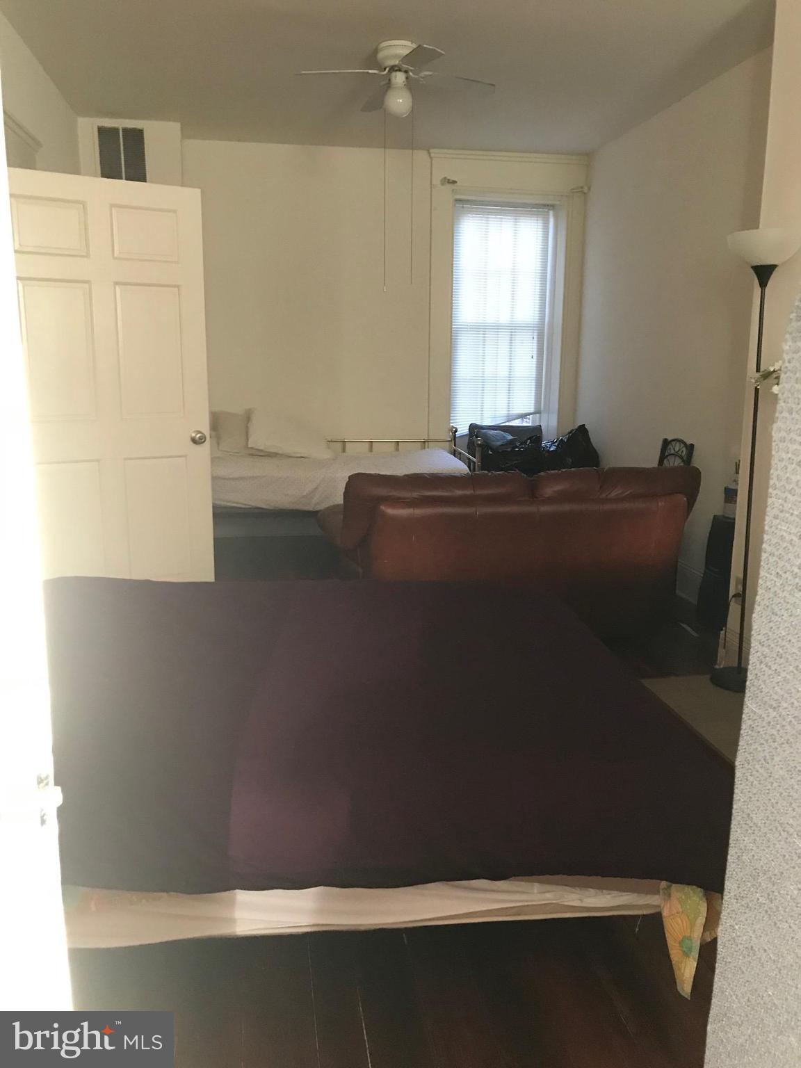 816 West Lombard Street Baltimore, MD 21201 - Photo 6 of 28 Fully Enclosed Living Room w/Decorative Fireplace