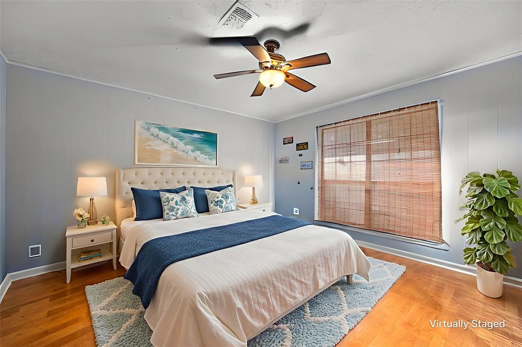 8850 Highway 1200 Boyce, LA 71409 - Photo 13 of 23 a bedroom with a large bed and a window