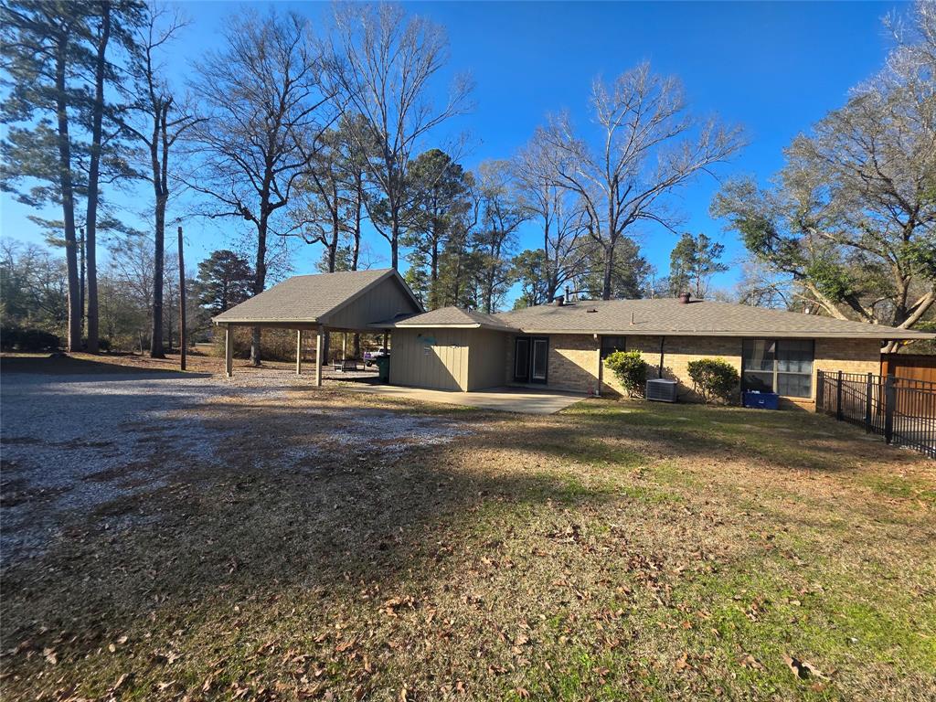 8850 Highway 1200 Boyce, LA 71409 - Photo 20 of 23 a view of house with yard and sitting area