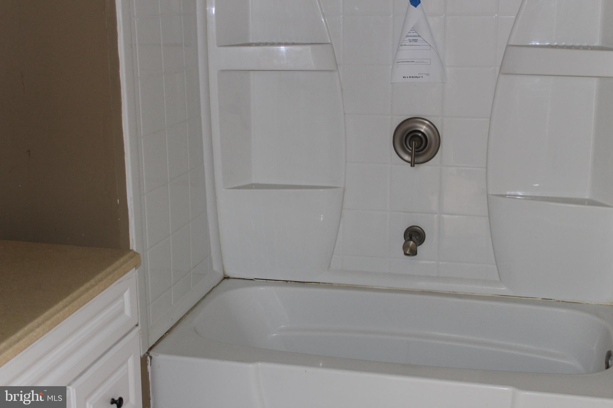 1048 Upper River Road Ewing, NJ 08628 - Photo 8 of 14 a bathroom with a shower