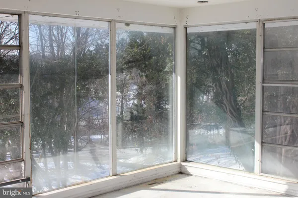 a bathroom with a glass door