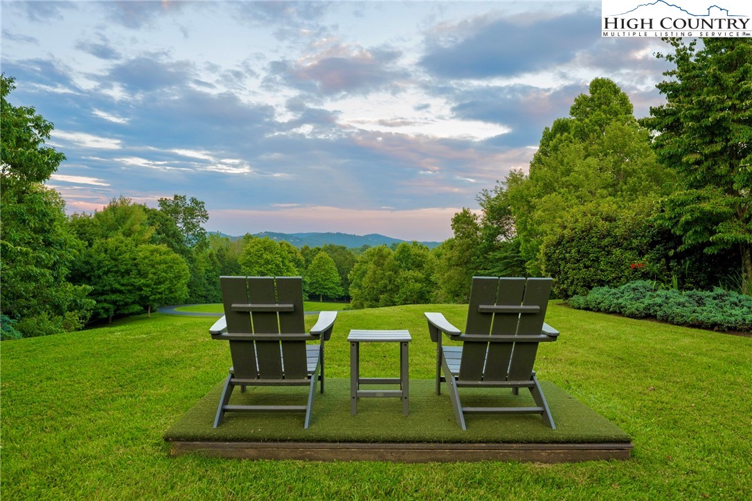 1920 Deck Hill Road Blowing Rock, NC 28605 - Photo 2 of 50 a view of a chairs in a backyard