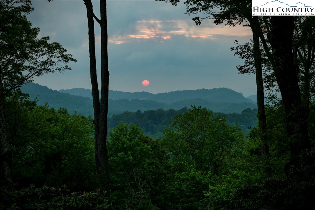 1920 Deck Hill Road Blowing Rock, NC 28605 - Photo 22 of 50 a view of a lake from a balcony