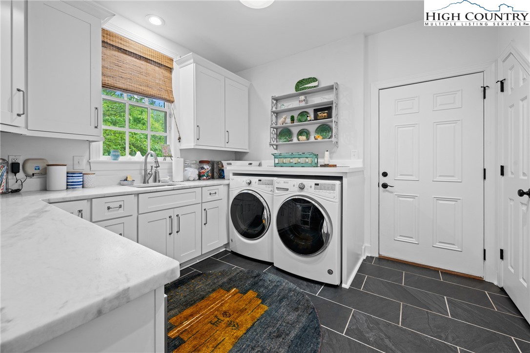 1920 Deck Hill Road Blowing Rock, NC 28605 - Photo 27 of 50 a utility room with sink dryer and washer
