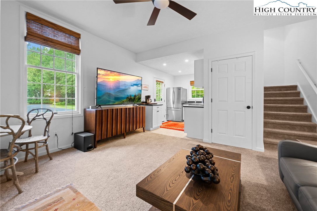 1920 Deck Hill Road Blowing Rock, NC 28605 - Photo 39 of 50 a livingroom with furniture staircase and a window